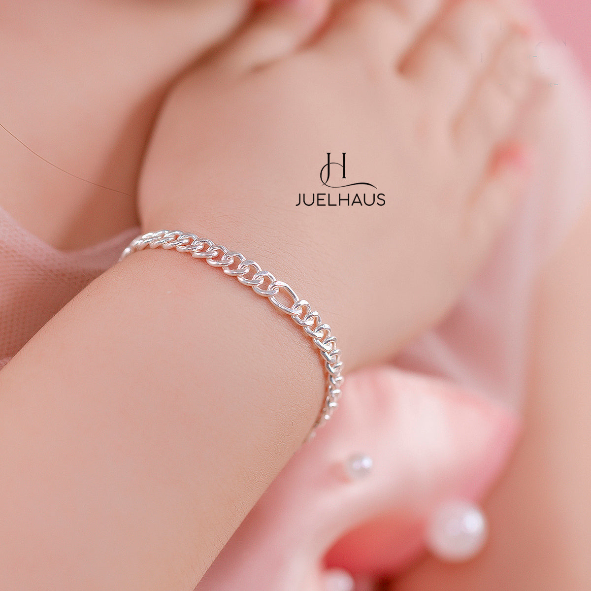 JUELHAUS Silver Baby Bracelets with Stylized Single String Bells Interspersed with Long Round Eyes