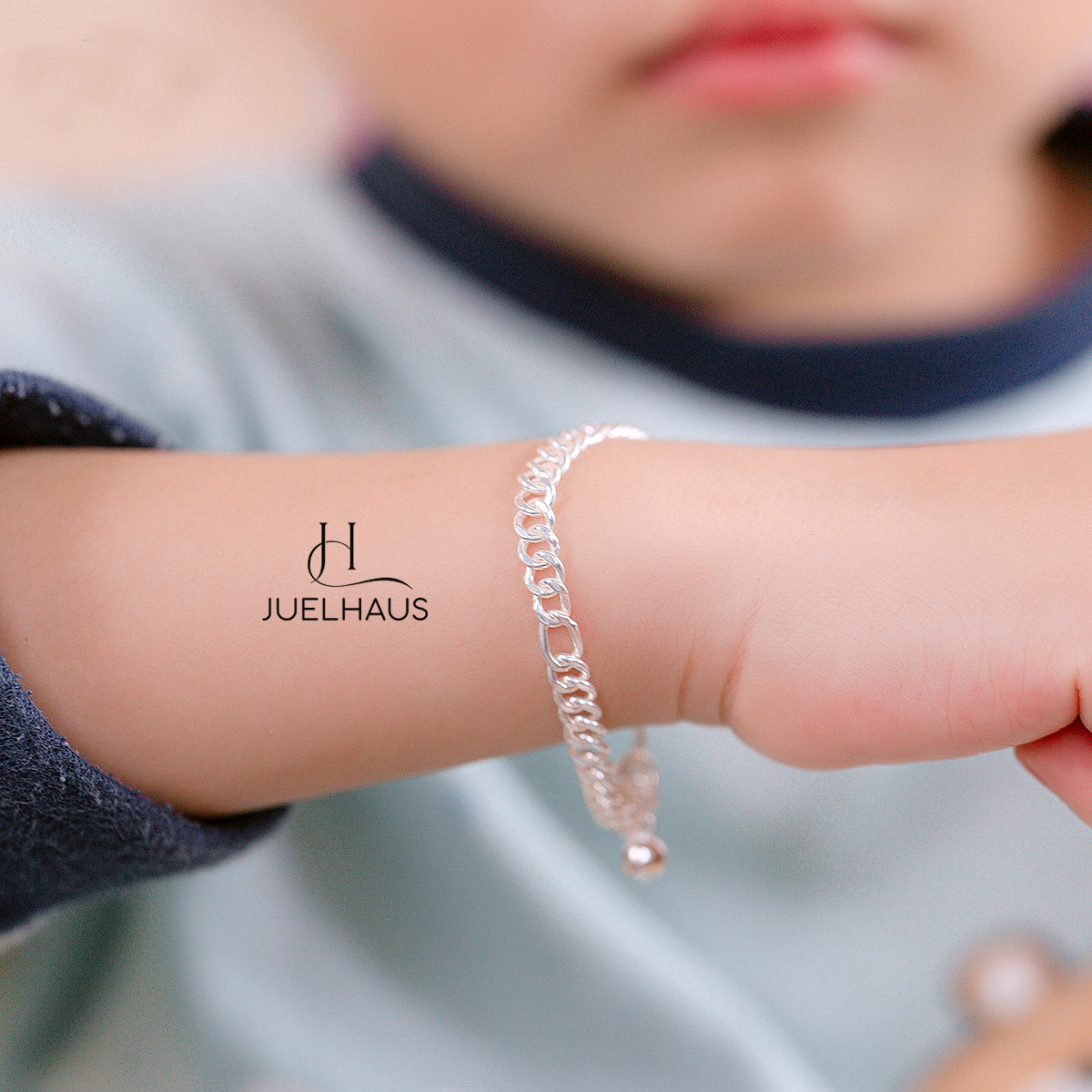 JUELHAUS Silver Baby Bracelets with Stylized Single String Bells Interspersed with Long Round Eyes