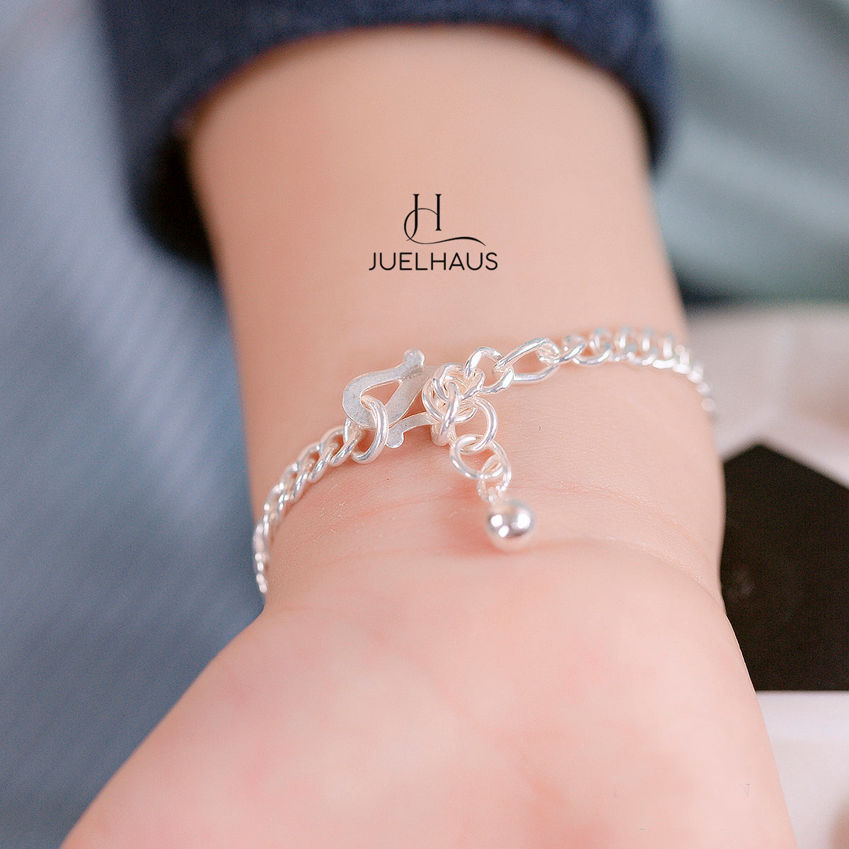 JUELHAUS Silver Baby Bracelets with Stylized Single String Bells Interspersed with Long Round Eyes