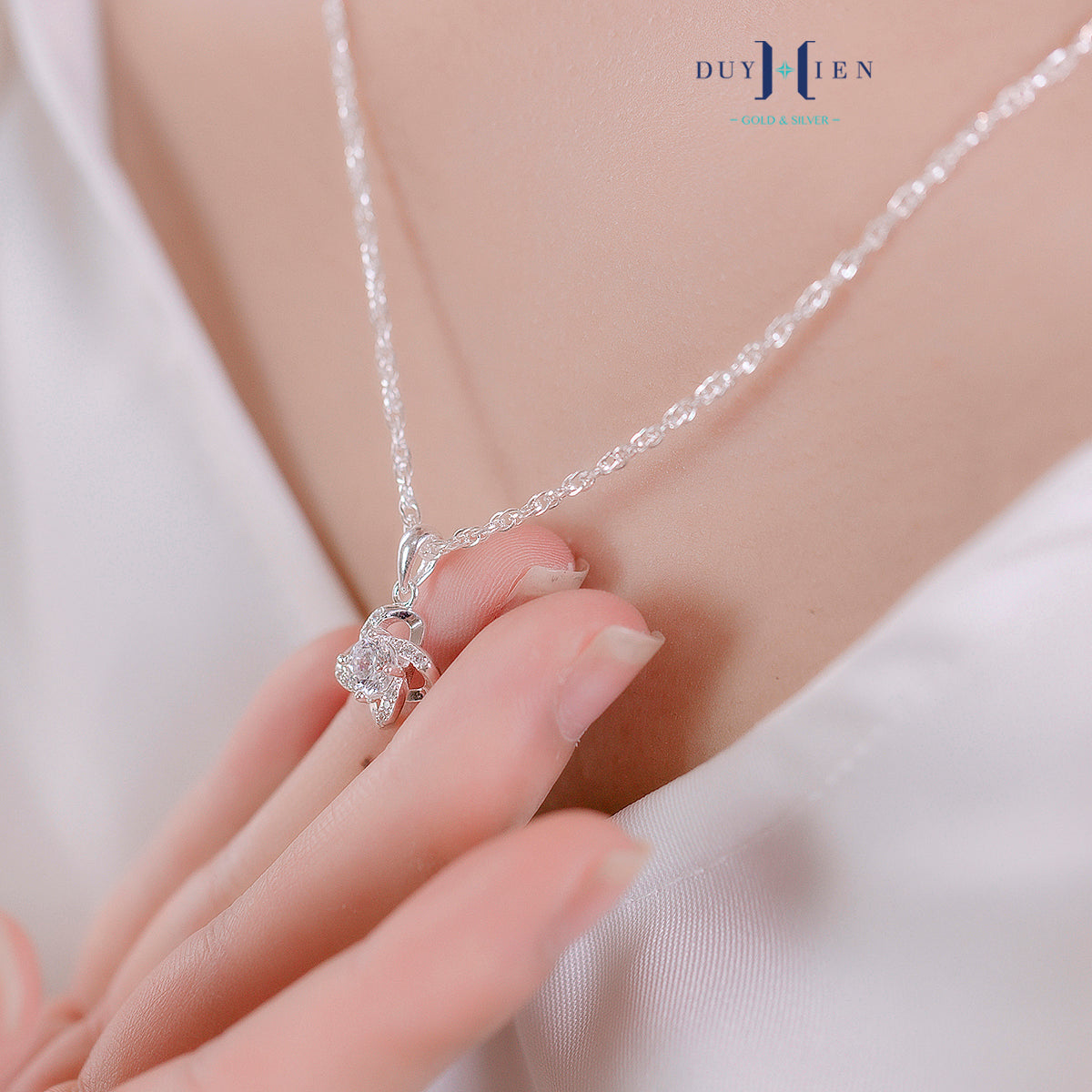 JUELHAUS Silver Necklace Gift for Sisters S990 Pure Love Knot Small and Beautiful Meaningful Eye-catching Modern Youthful Design