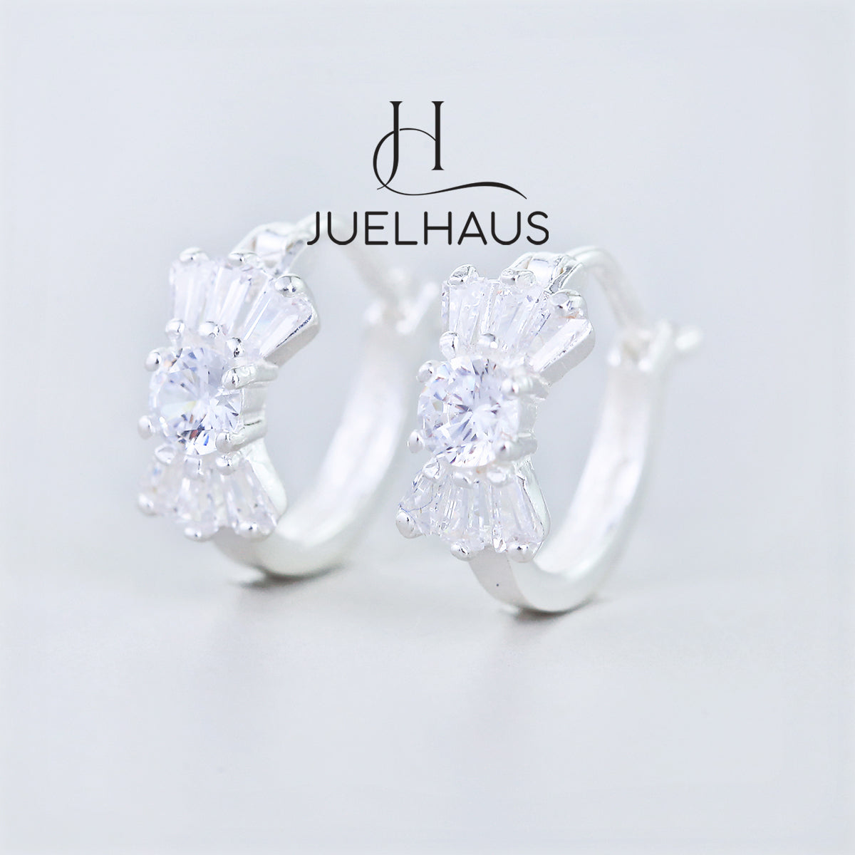 JUELHAUS Silver Earrings for Babies in Round Bow Shape with 2 Excellently Beautiful Crystal Shapes