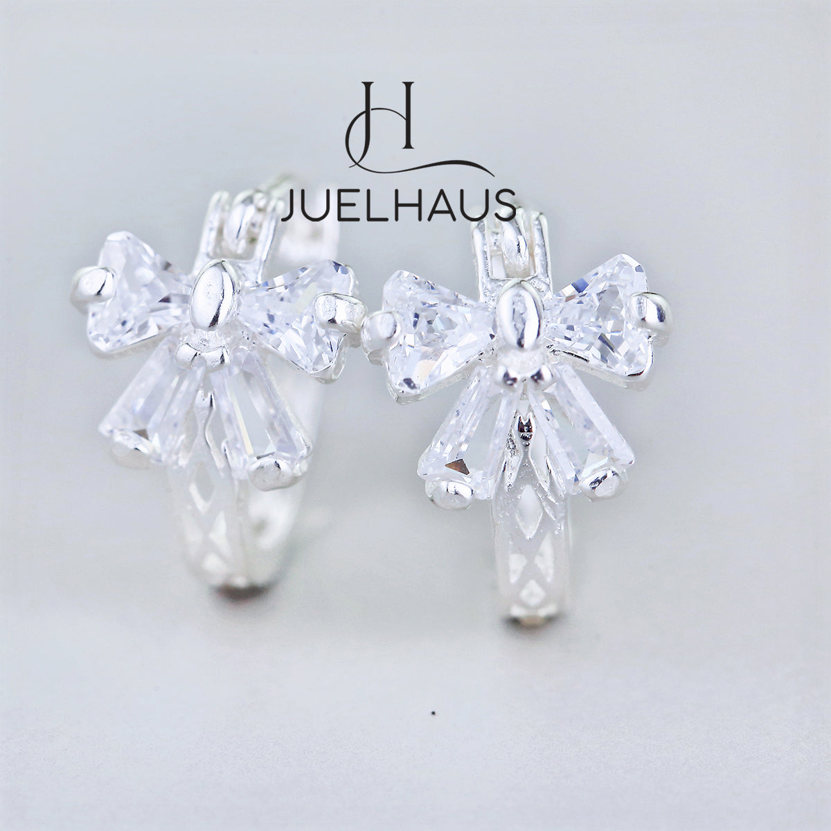 JUELHAUS Lovely and Outstanding Round Bow Shaped Silver Earrings for Children