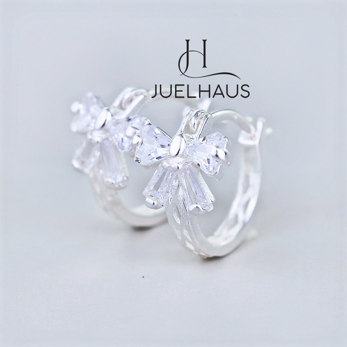JUELHAUS Lovely and Outstanding Round Bow Shaped Silver Earrings for Children