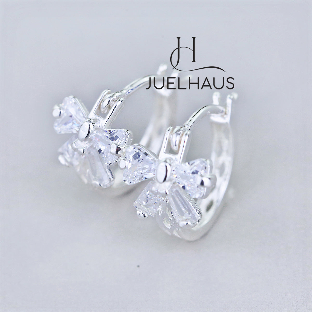 JUELHAUS Lovely and Outstanding Round Bow Shaped Silver Earrings for Children