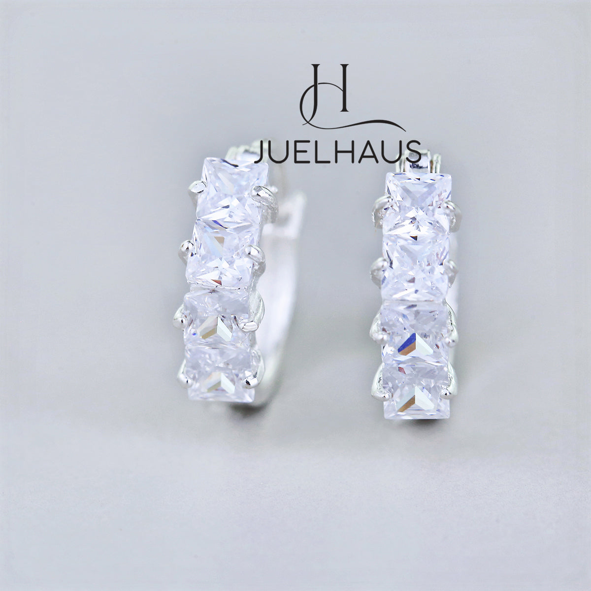 JUELHAUS Simple but extremely bright white single row white stone earrings, non-round style with extremely sturdy clasp