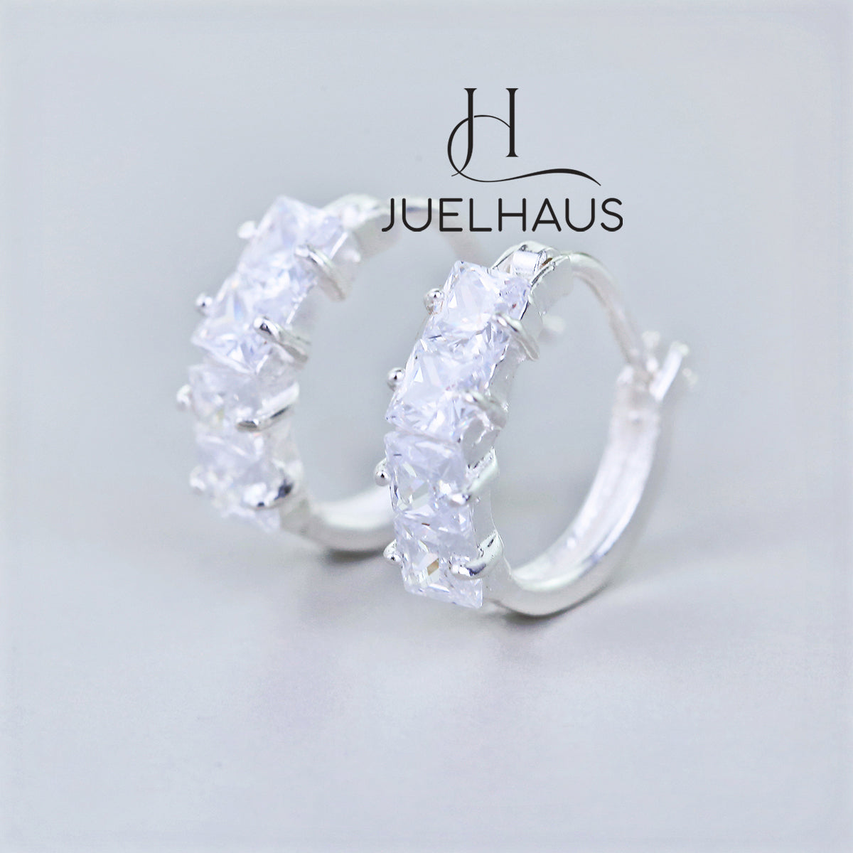 JUELHAUS Simple but extremely bright white single row white stone earrings, non-round style with extremely sturdy clasp