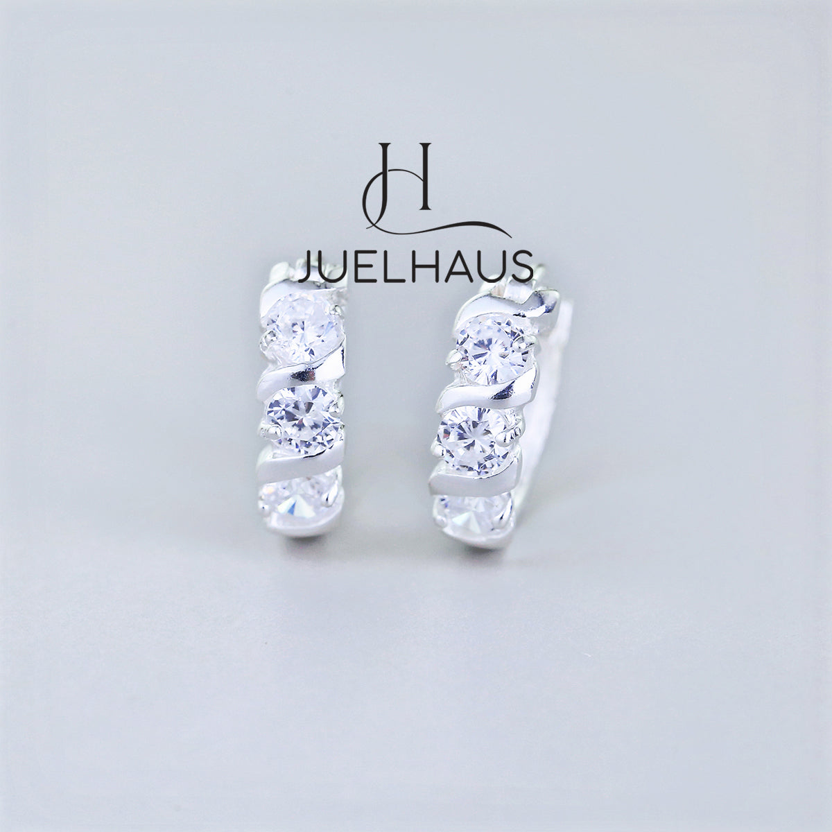 JUELHAUS Simple but extremely bright white single row white stone earrings, non-round style with extremely sturdy clasp