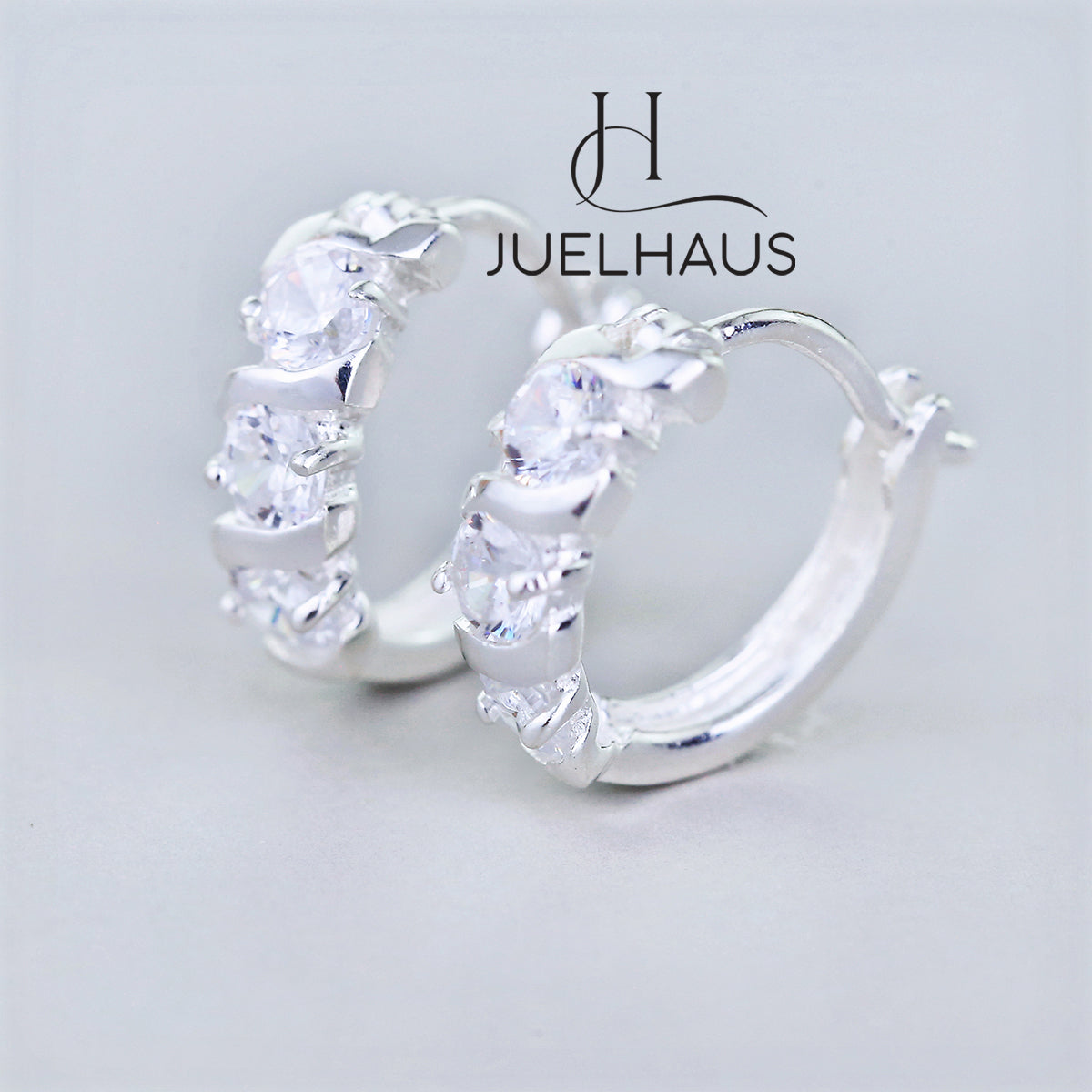 JUELHAUS Simple but extremely bright white single row white stone earrings, non-round style with extremely sturdy clasp