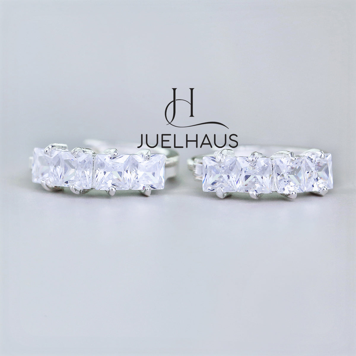 JUELHAUS Simple but extremely bright white single row white stone earrings, non-round style with extremely sturdy clasp