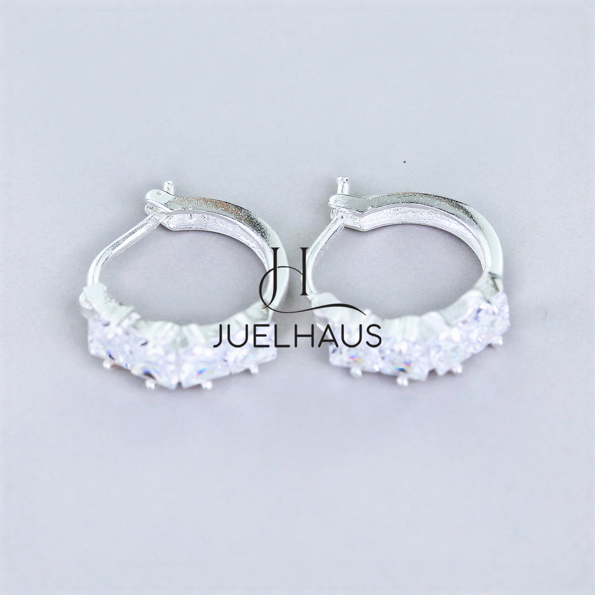 JUELHAUS Simple but extremely bright white single row white stone earrings, non-round style with extremely sturdy clasp