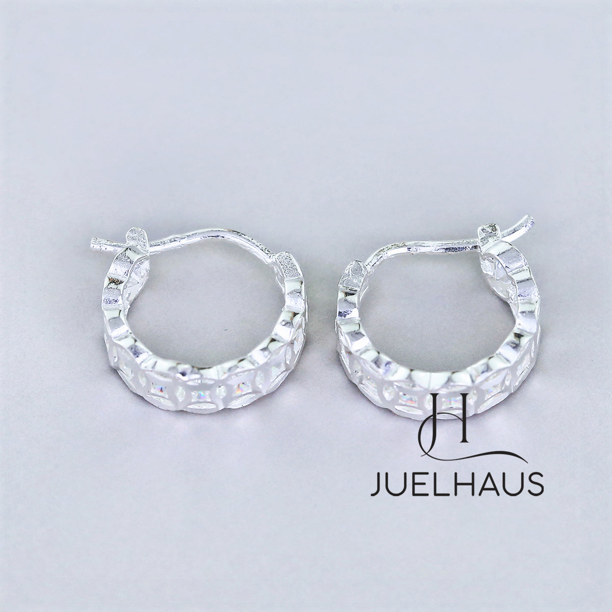 JUELHAUS Silver Earrings for Children, Non-Round Shaped with Sparkling Milled Money