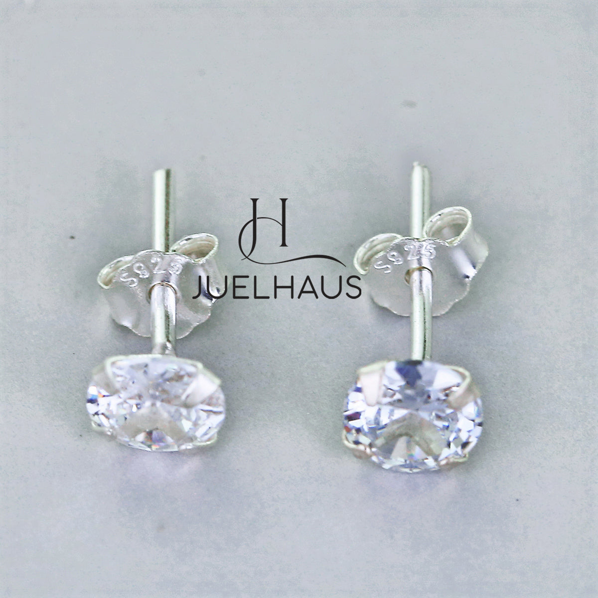 JUELHAUS Silver Earrings With White Stone Buds Round Full Size Easy To Wear Simple Personality