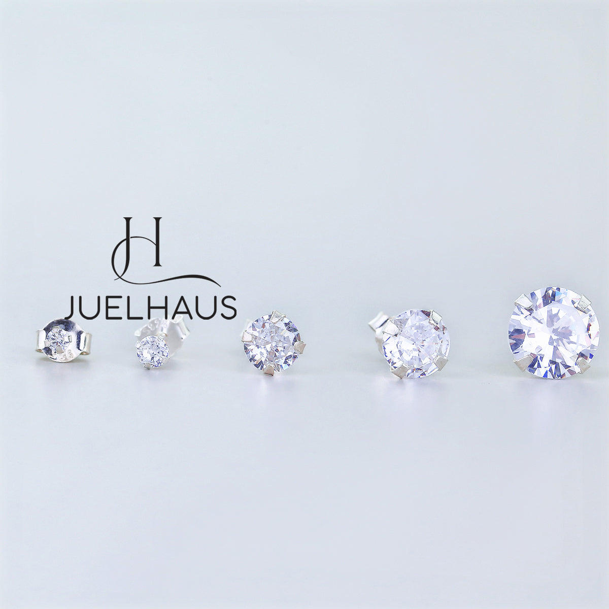 JUELHAUS Silver Earrings With White Stone Buds Round Full Size Easy To Wear Simple Personality