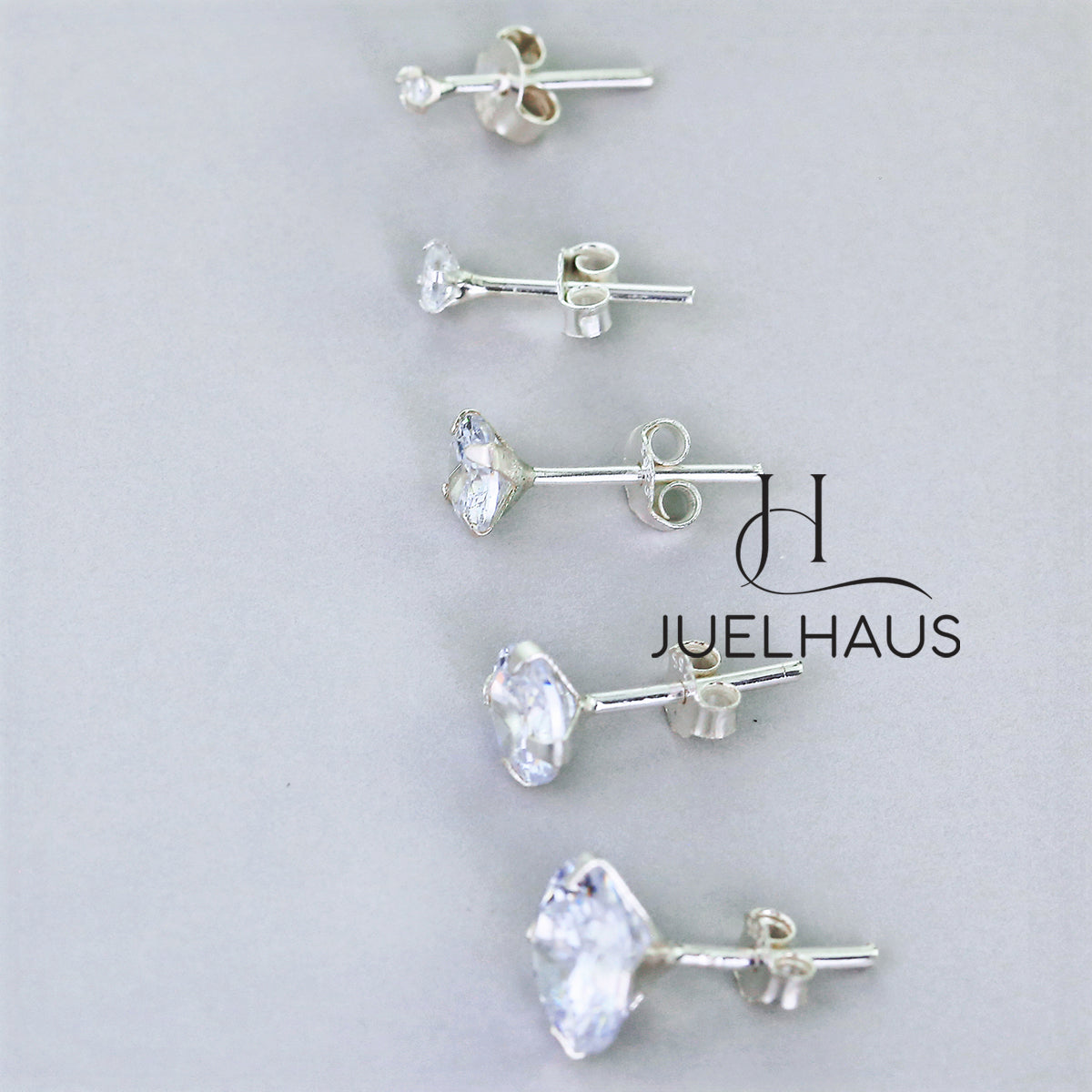 JUELHAUS Silver Earrings With White Stone Buds Round Full Size Easy To Wear Simple Personality