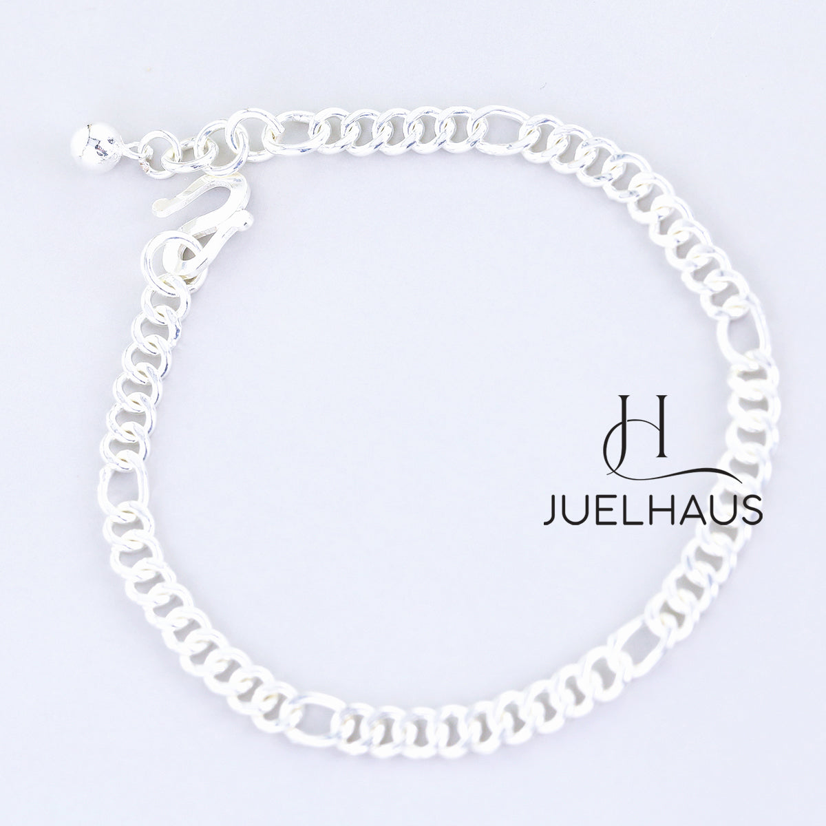 JUELHAUS Silver Baby Bracelets with Stylized Single String Bells Interspersed with Long Round Eyes