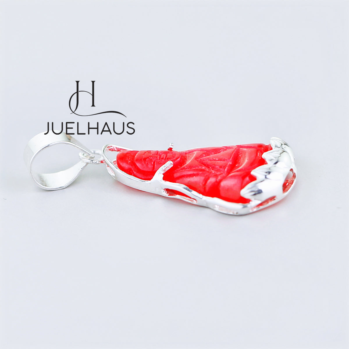JUELHAUS Silver Pendant with the Image of Bodhisattva Avalokiteshvara Made of Red Agate and Covered with Plain Silver Border