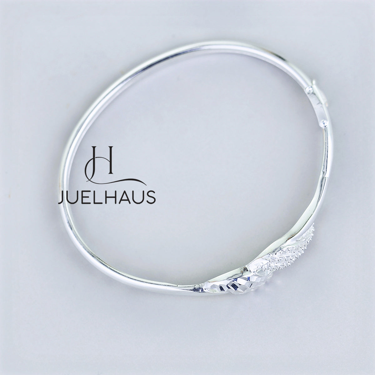 JUELHAUS Women's Silver Bracelet with 2 Waves and Attractive Stones