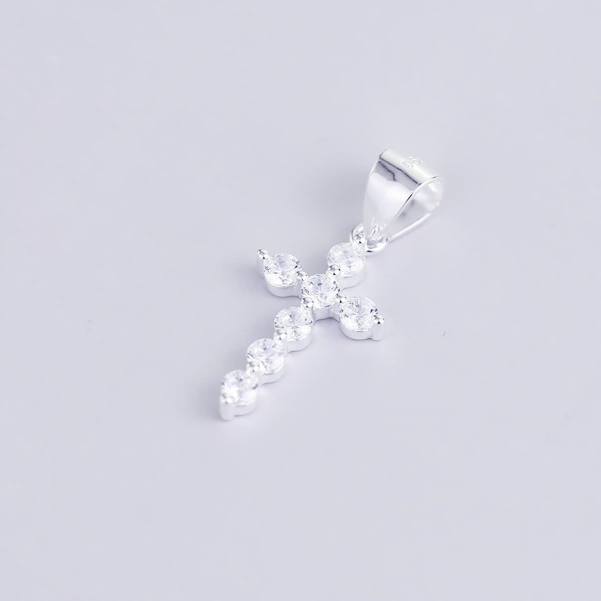 JUELHAUS Silver Pendant Pure S990 Simple Cross Shape Consisting of 7 Stones 2.5 Cups Tied Together Delicately