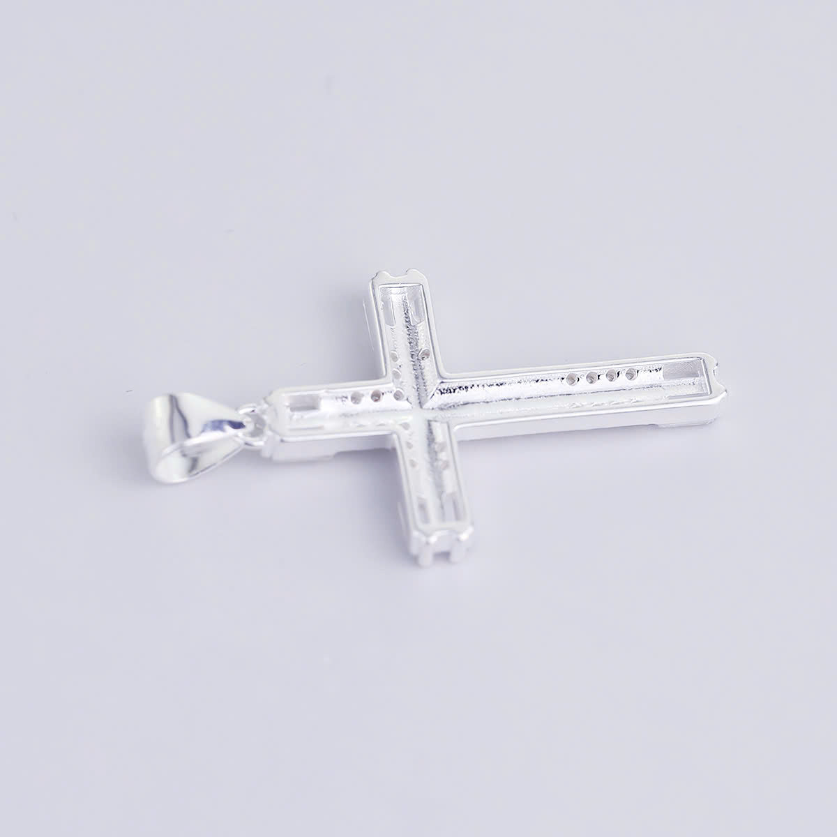 JUELHAUS S990 Pure Silver Cross Pendant With Luxurious 4-Headed Baguette Stone Jesus Statue
