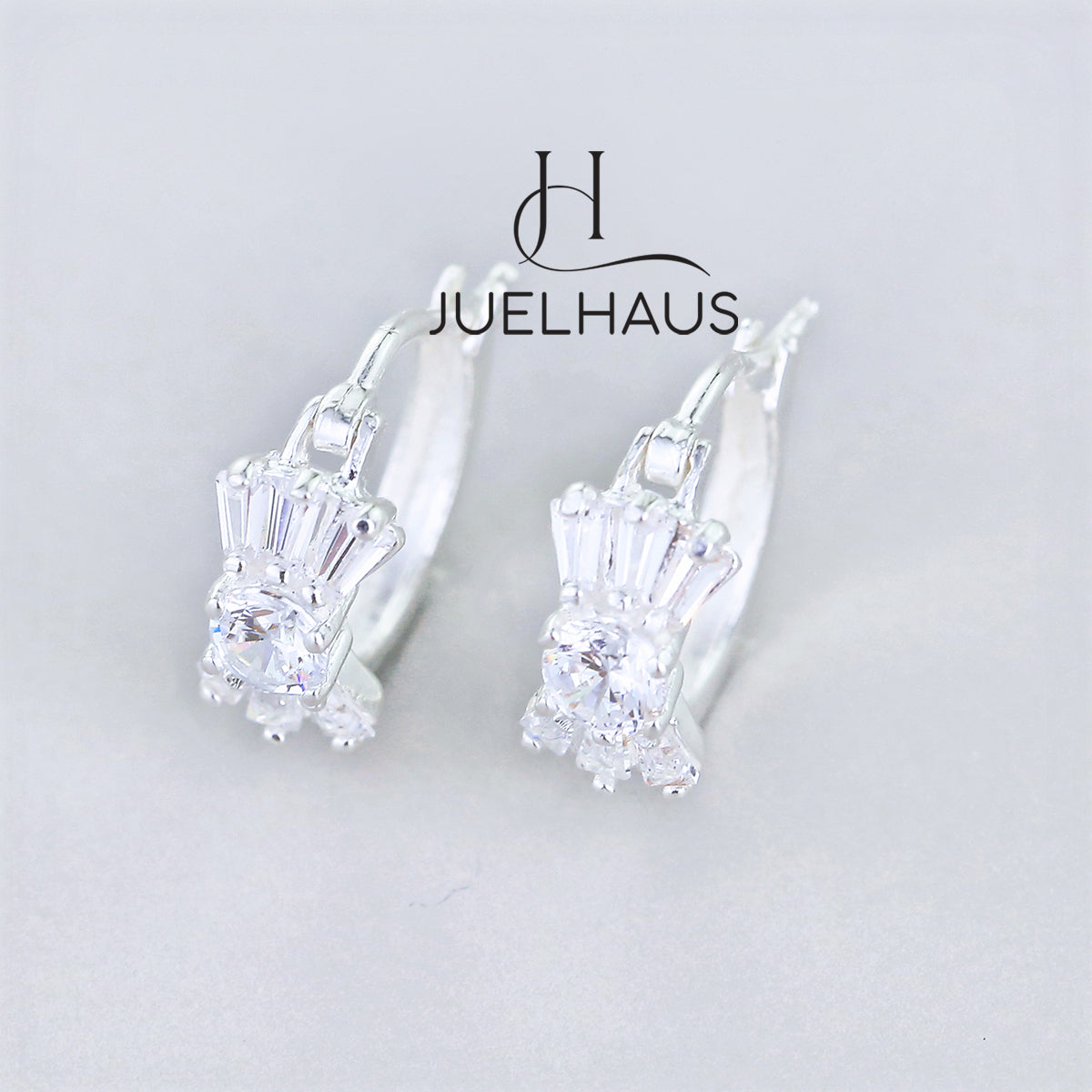JUELHAUS Silver Earrings for Babies in Round Bow Shape with 2 Excellently Beautiful Crystal Shapes