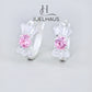 JUELHAUS Silver Earrings for Babies in Round Bow Shape with 2 Excellently Beautiful Crystal Shapes