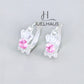 JUELHAUS Silver Earrings for Babies in Round Bow Shape with 2 Excellently Beautiful Crystal Shapes