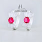 JUELHAUS Silver Earrings for Babies in Round Bow Shape with 2 Excellently Beautiful Crystal Shapes