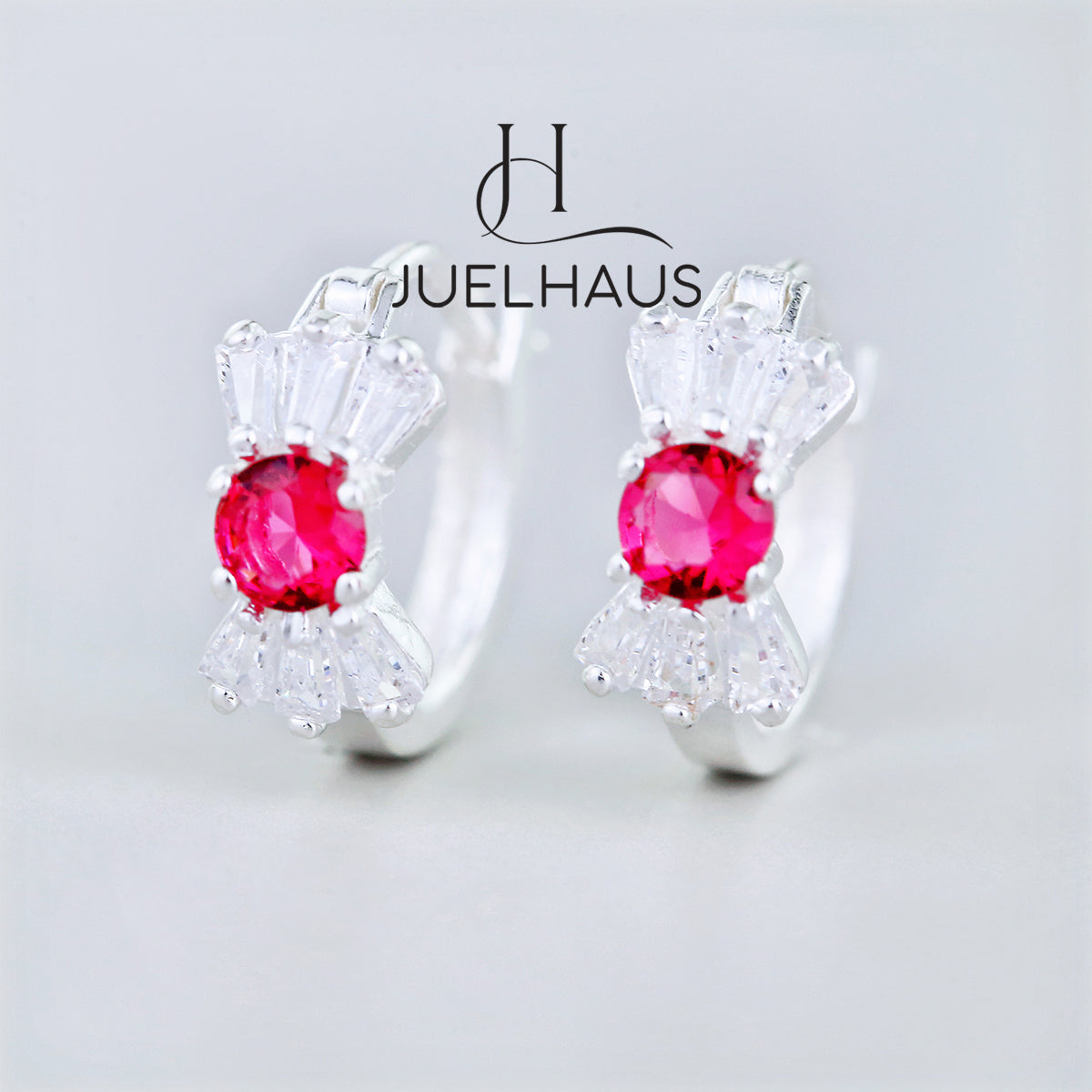 JUELHAUS Silver Earrings for Babies in Round Bow Shape with 2 Excellently Beautiful Crystal Shapes