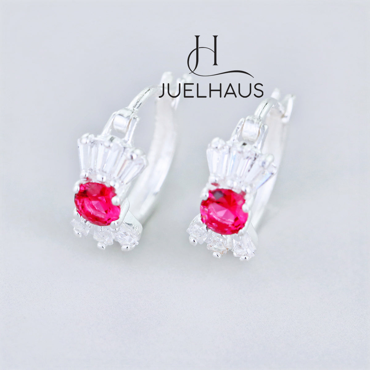 JUELHAUS Silver Earrings for Babies in Round Bow Shape with 2 Excellently Beautiful Crystal Shapes