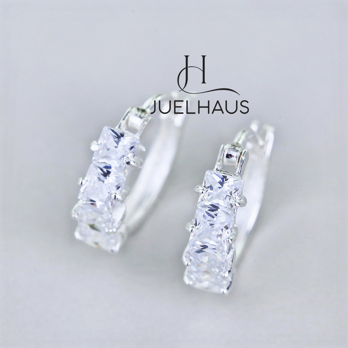 JUELHAUS Simple but extremely bright white single row white stone earrings, non-round style with extremely sturdy clasp