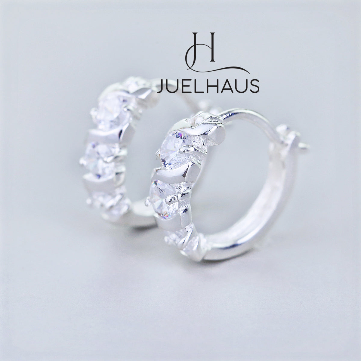 JUELHAUS Simple but extremely bright white single row white stone earrings, non-round style with extremely sturdy clasp