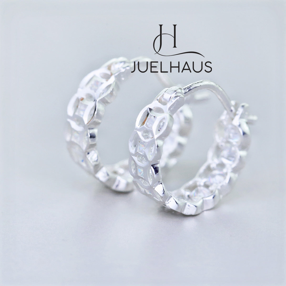 JUELHAUS Silver Earrings for Children, Non-Round Shaped with Sparkling Milled Money