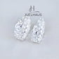 JUELHAUS Silver Earrings for Children, Non-Round Shaped with Sparkling Milled Money