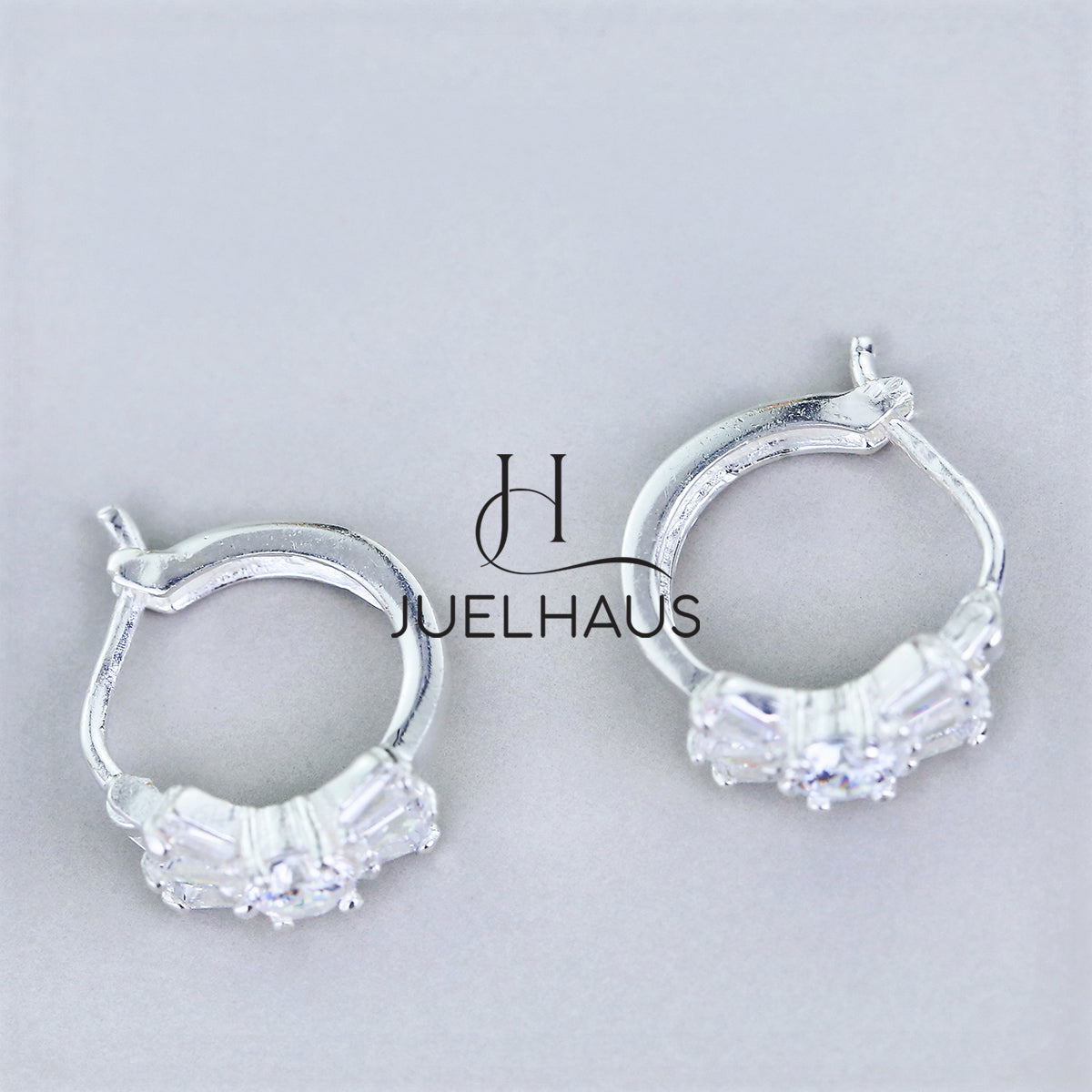 JUELHAUS Silver Earrings for Babies in Round Bow Shape with 2 Excellently Beautiful Crystal Shapes