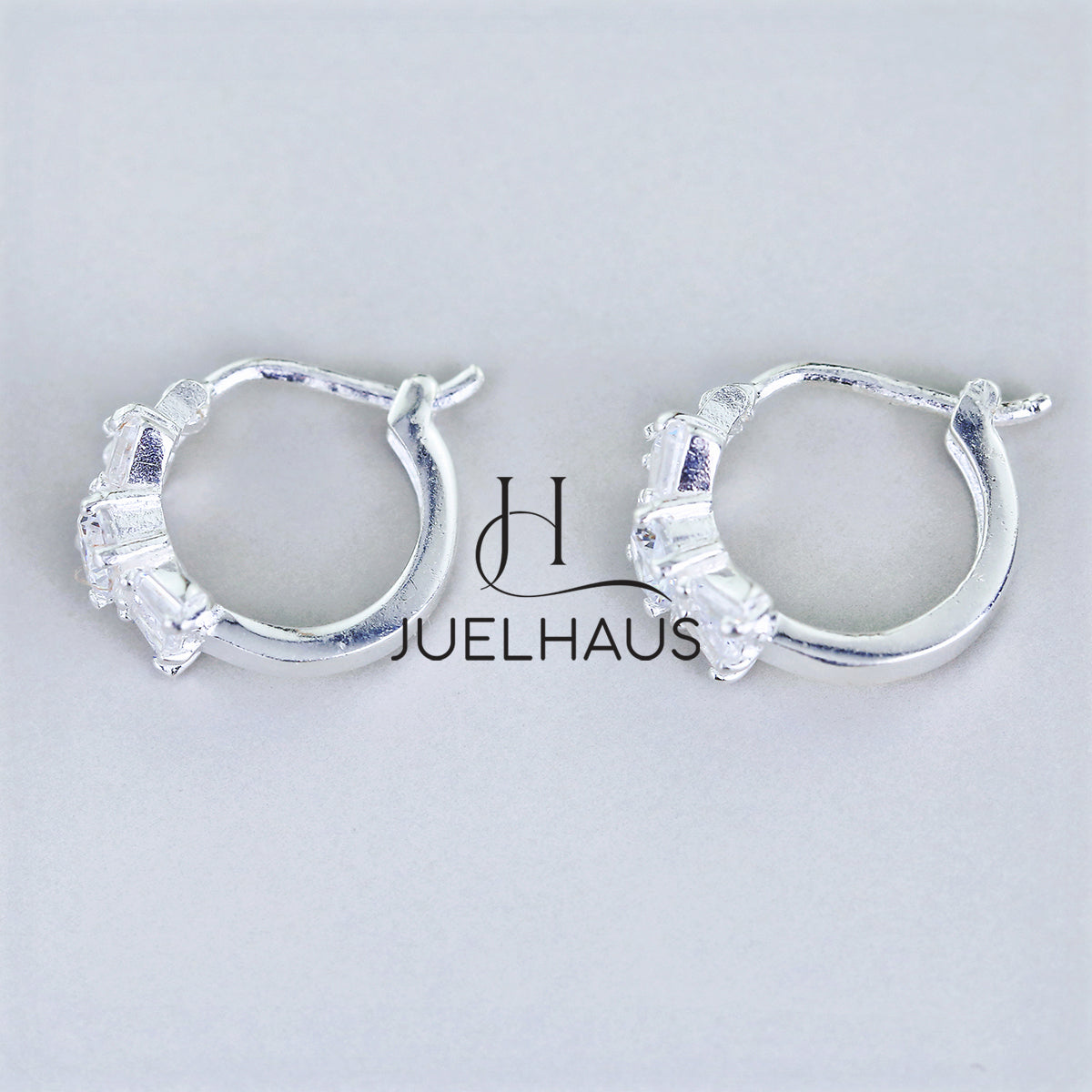 JUELHAUS Silver Earrings for Babies in Round Bow Shape with 2 Excellently Beautiful Crystal Shapes