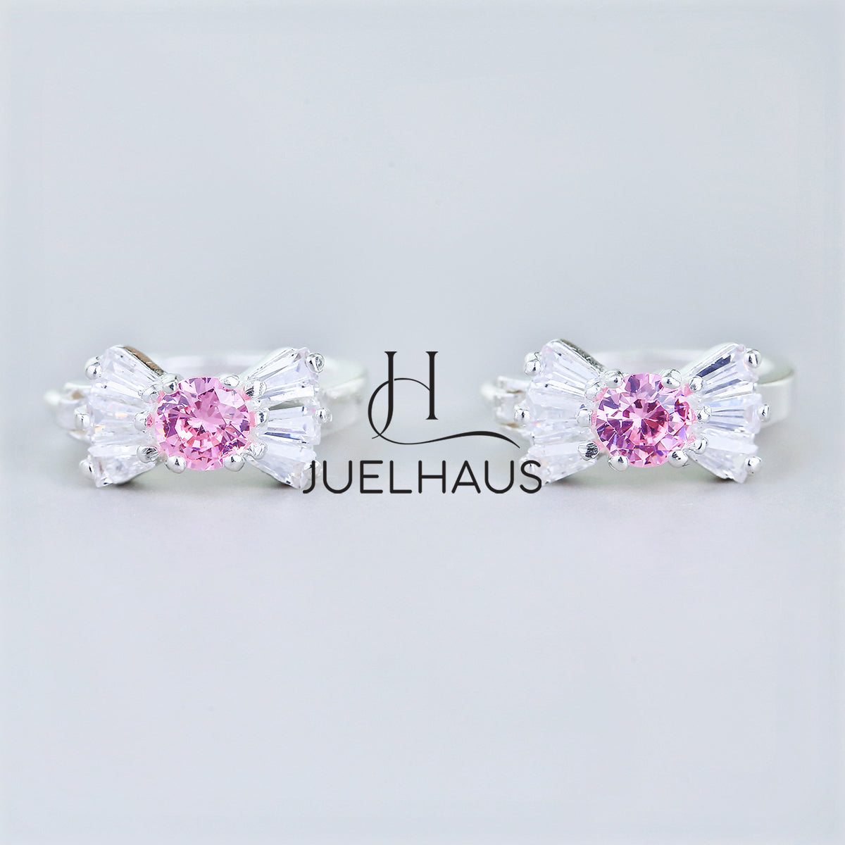 JUELHAUS Silver Earrings for Babies in Round Bow Shape with 2 Excellently Beautiful Crystal Shapes