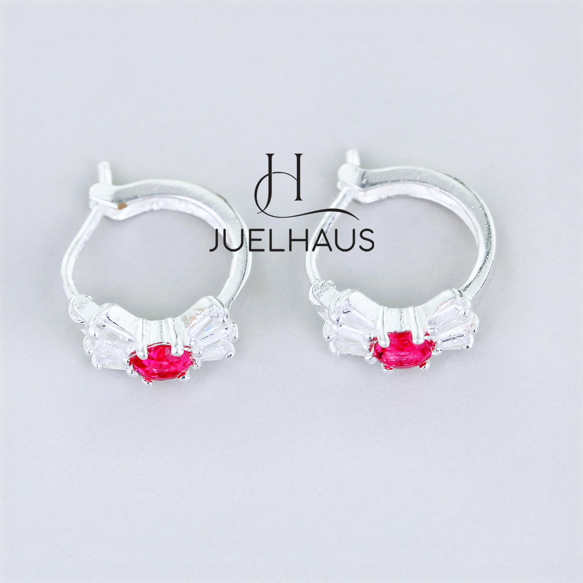 JUELHAUS Silver Earrings for Babies in Round Bow Shape with 2 Excellently Beautiful Crystal Shapes