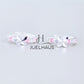 JUELHAUS  Silver Earrings for Children, Non-Round Style, 1 Row of Cute Small Stones with 4 Bright Milled Flowers
