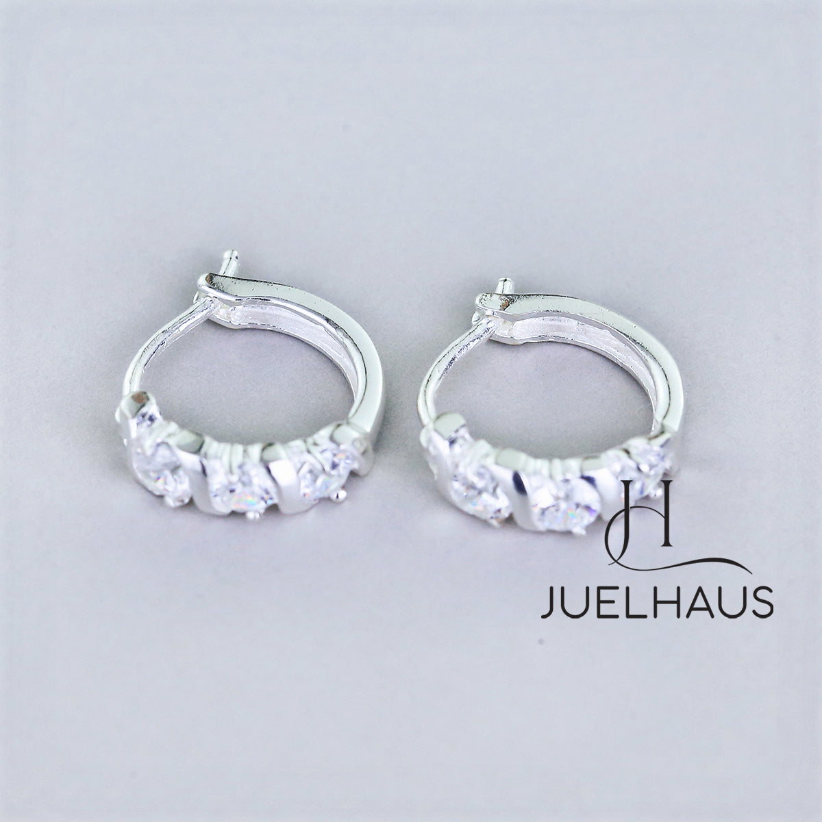 JUELHAUS Simple but extremely bright white single row white stone earrings, non-round style with extremely sturdy clasp