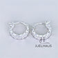JUELHAUS Silver Earrings for Children, Non-Round Shaped with Sparkling Milled Money