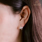JUELHAUS  Women's Sterling Silver Earrings with Solid Round Stones with 3 Outstanding Horizontal Stones