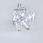 JUELHAUS  Women's Sterling Silver Earrings with Solid Round Stones with 3 Outstanding Horizontal Stones