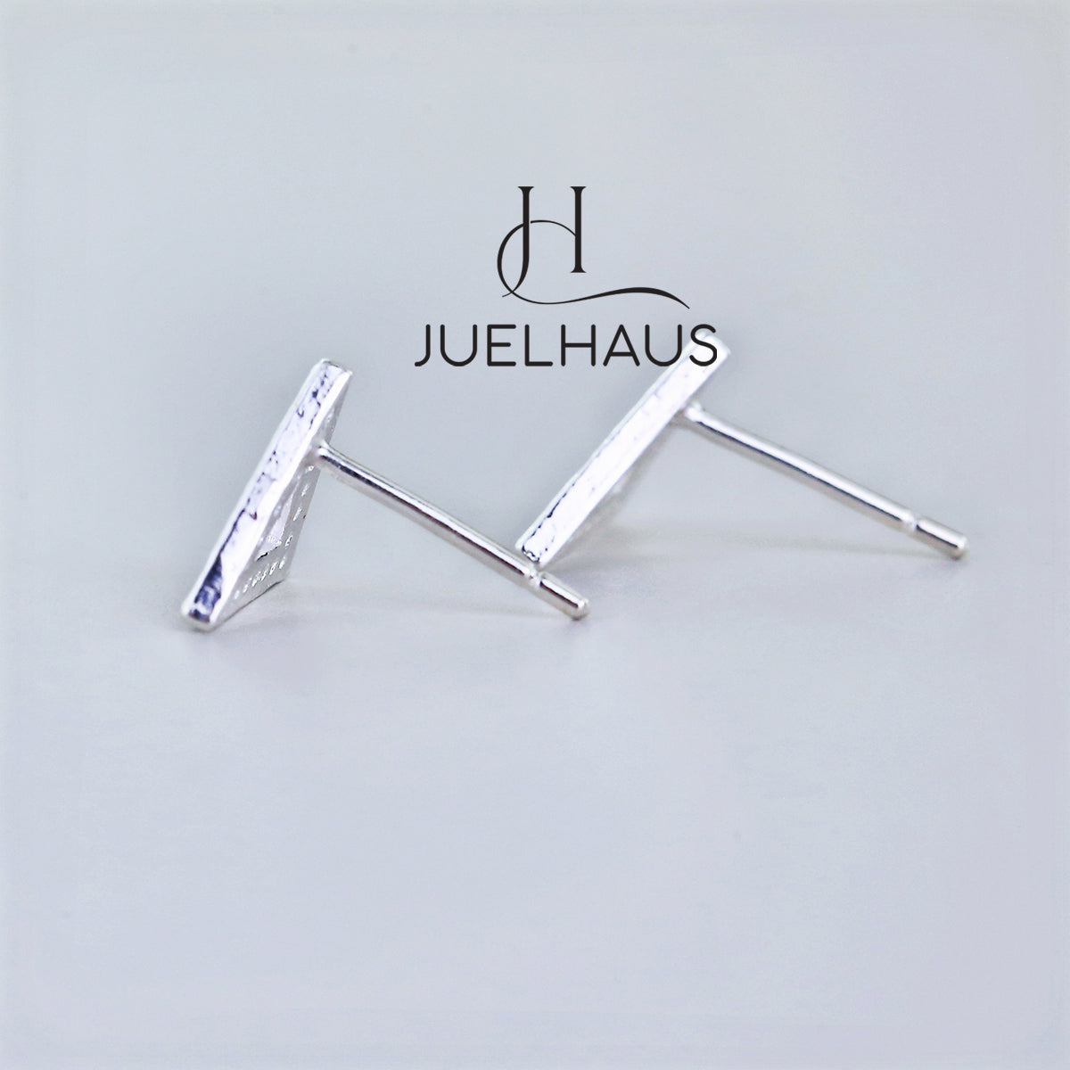 JUELHAUS Silver Triangle Stud Earrings with Unique and Stylish Gemstones