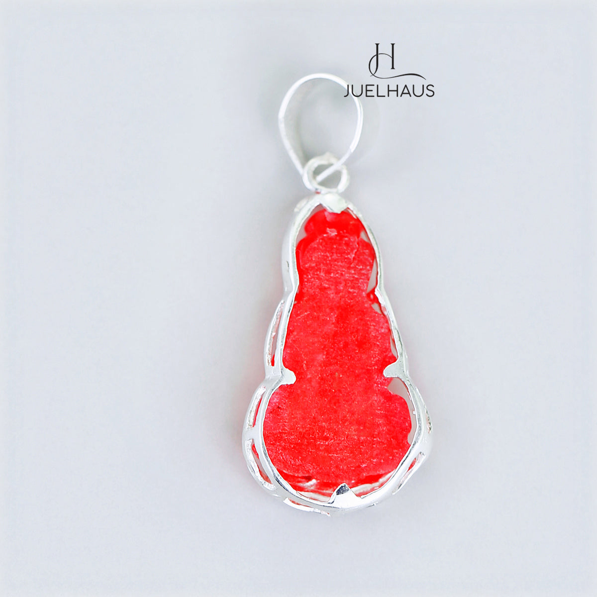 JUELHAUS Silver Pendant with the Image of Bodhisattva Avalokiteshvara Made of Red Agate and Covered with Plain Silver Border