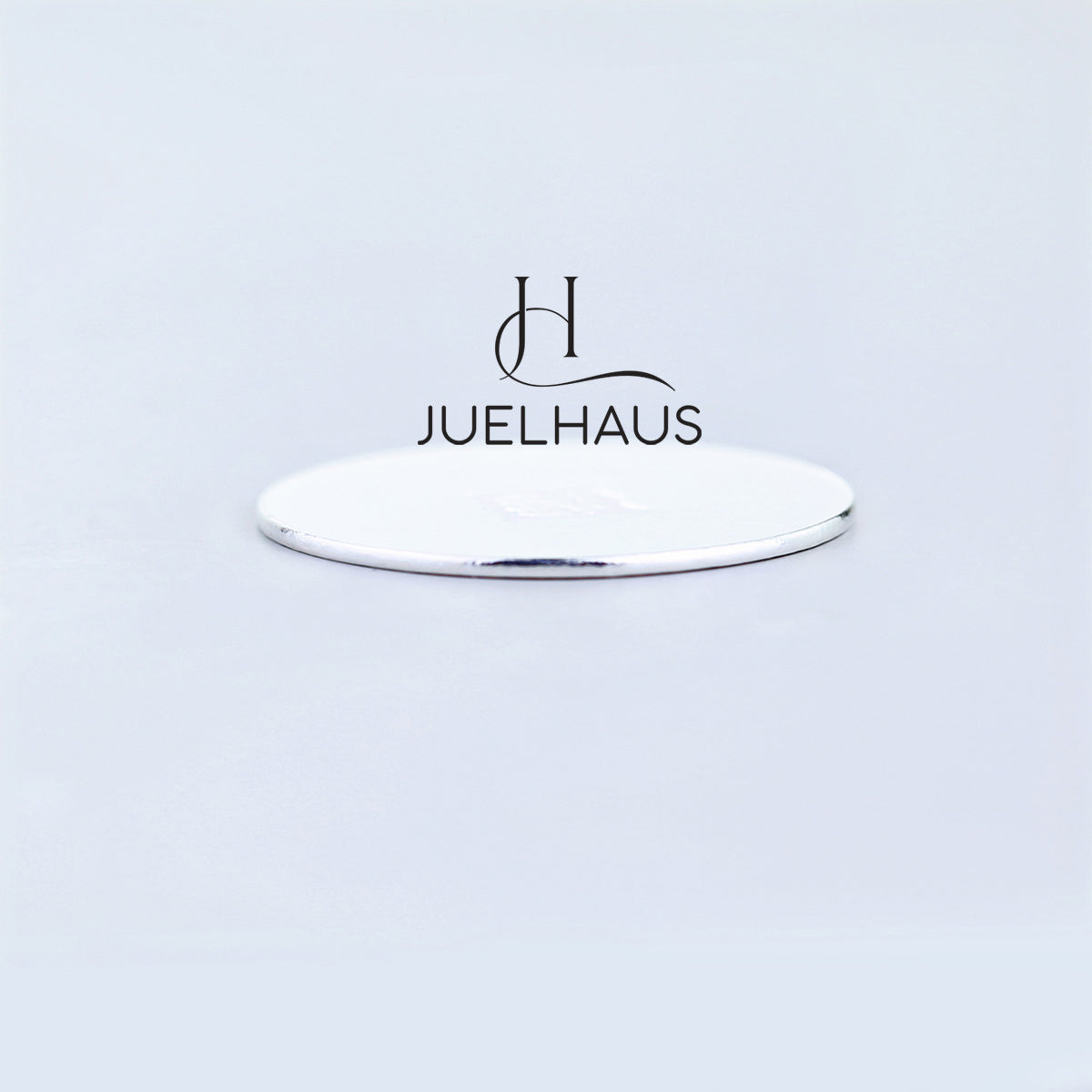 JUELHAUS Smooth, wind-scraped silver coins come in many sizes