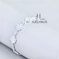 JUELHAUS S990 Pure Silver Bracelet for Women with 4 Leaf Clover and Sparkling Stone
