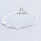 JUELHAUS S990 Pure Silver Bracelet for Women with 4 Leaf Clover and Sparkling Stone