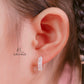 JUELHAUS Simple but extremely bright white single row white stone earrings, non-round style with extremely sturdy clasp
