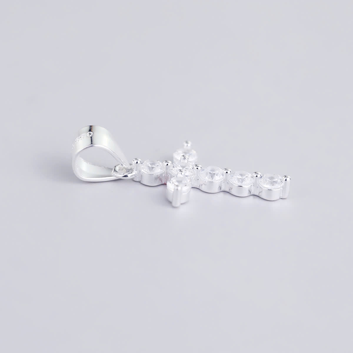 JUELHAUS Silver Pendant Pure S990 Simple Cross Shape Consisting of 7 Stones 2.5 Cups Tied Together Delicately