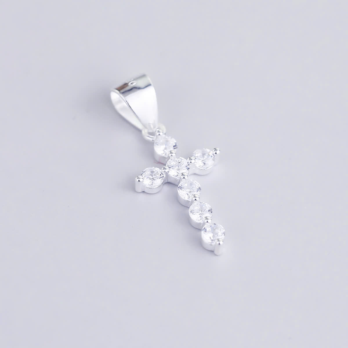 JUELHAUS Silver Pendant Pure S990 Simple Cross Shape Consisting of 7 Stones 2.5 Cups Tied Together Delicately